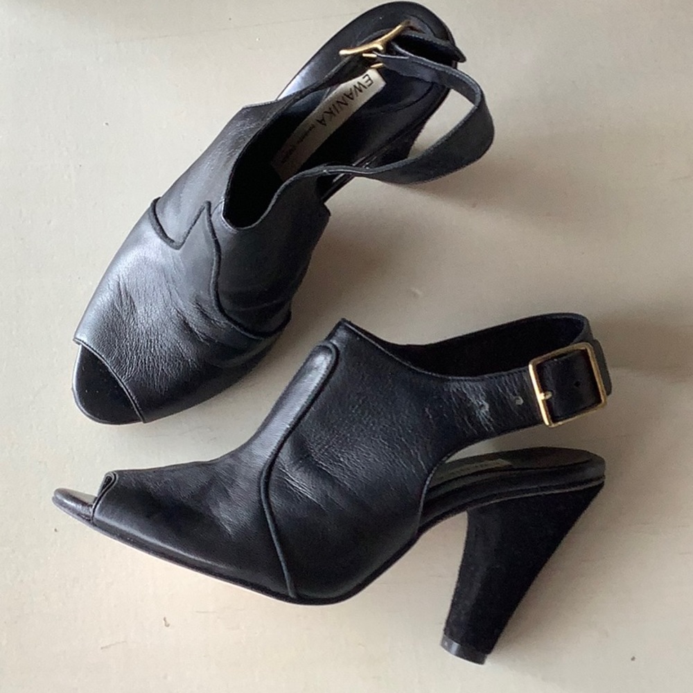 Mint condition Olivia Rose Tal for EWANIKA black peep toe heels, size 7.